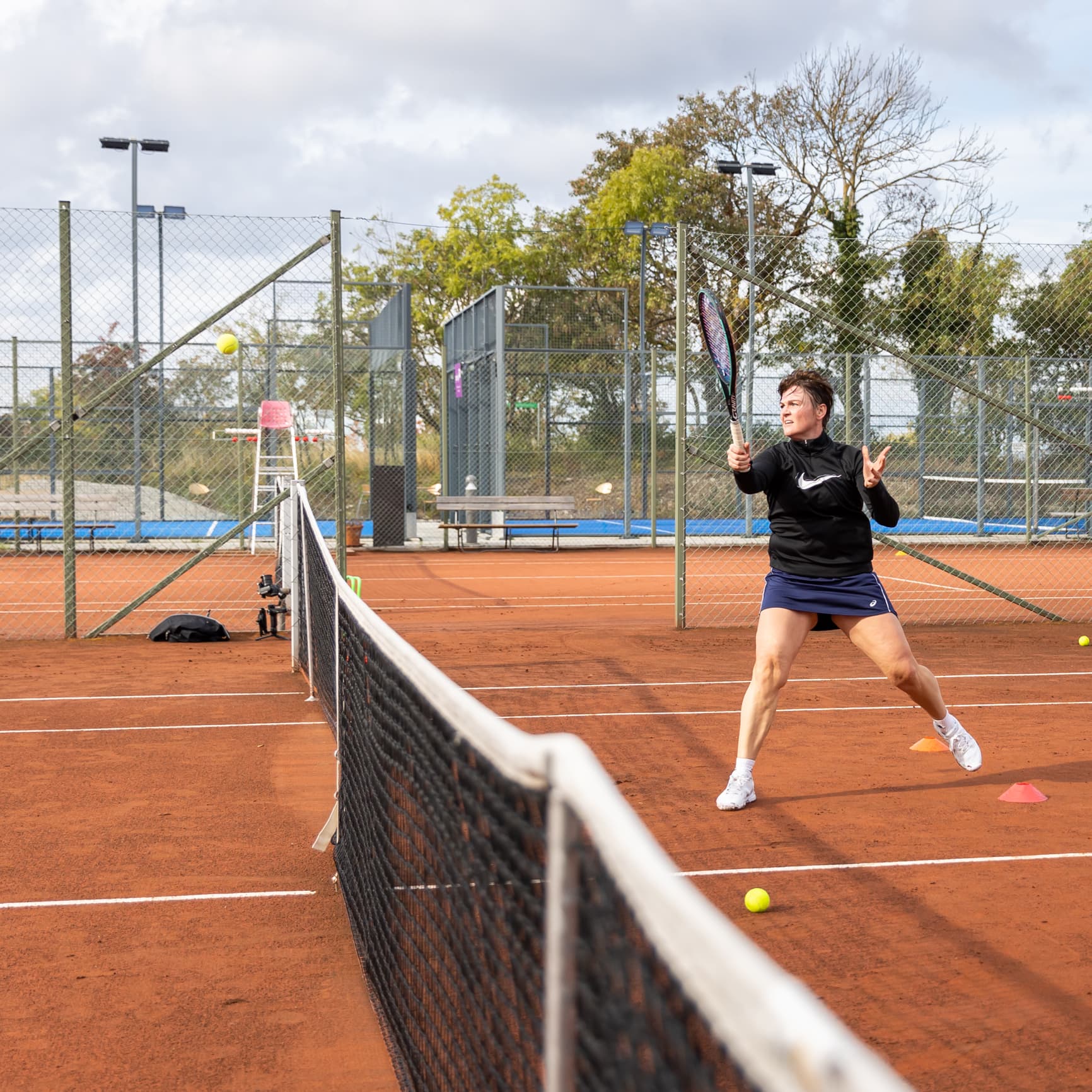 Spela Tennis